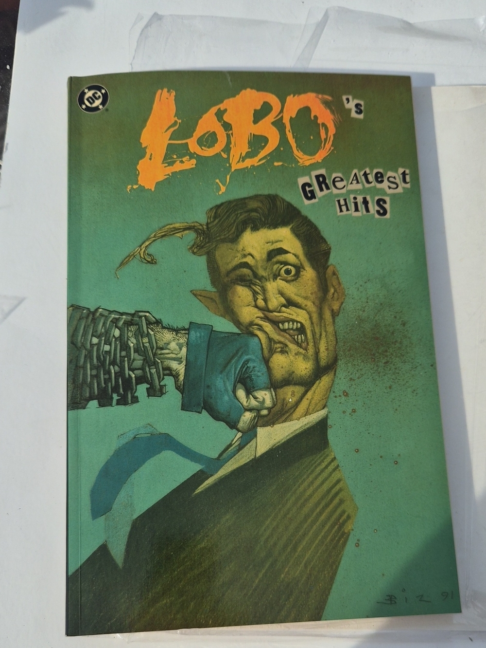 DC LOBO's Greatest Hits Graphic Novel - Green Cover with Orange Title Art